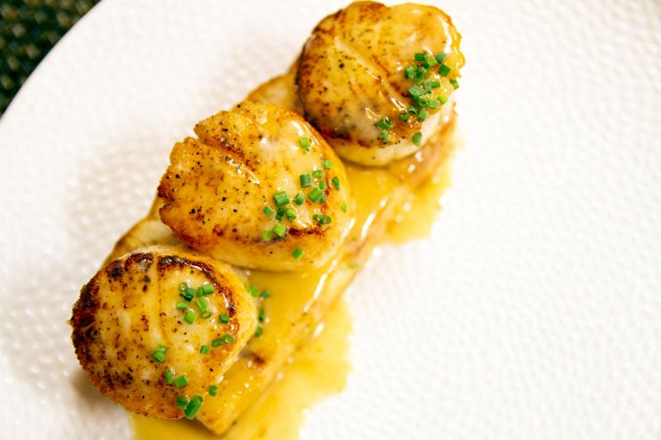 Close up of scallops entree